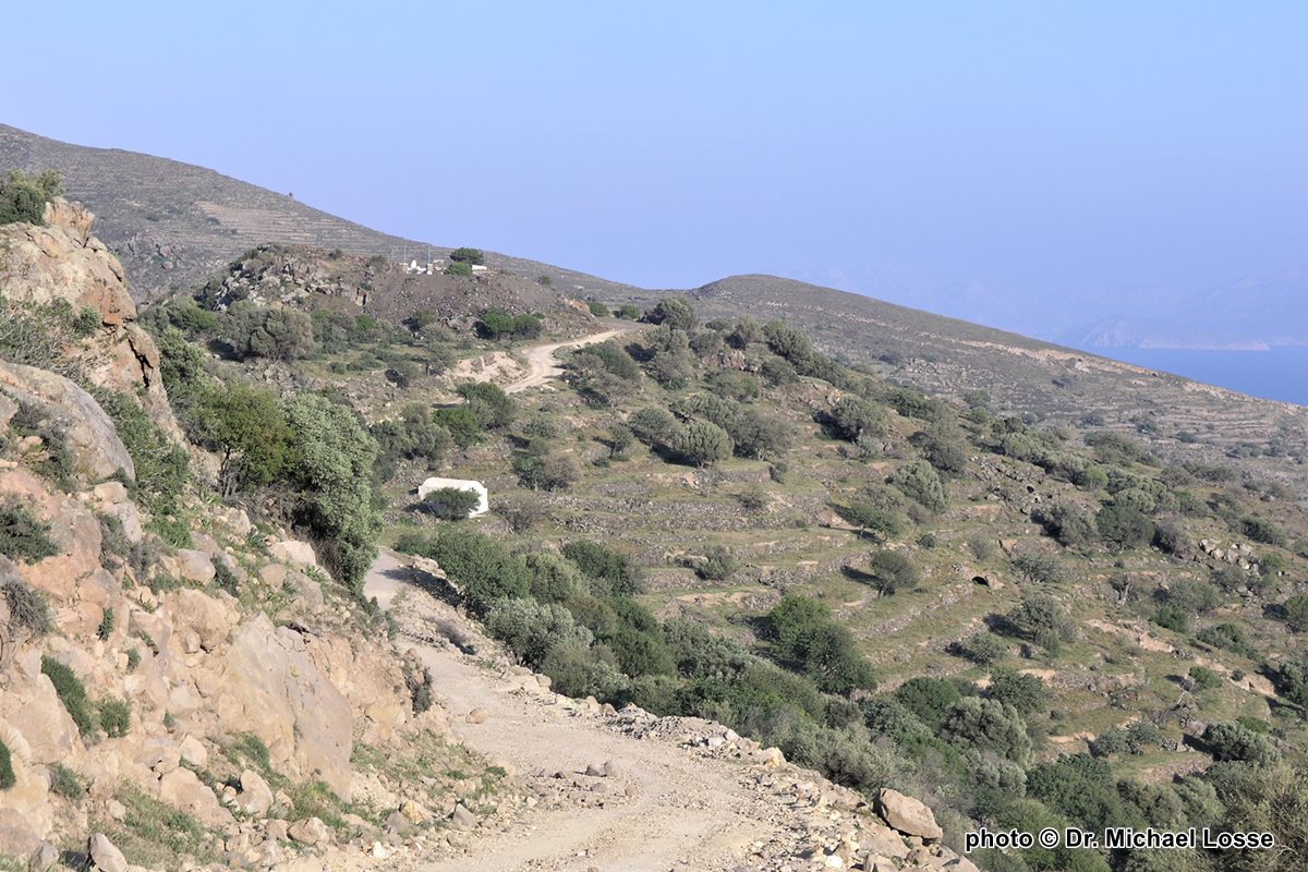 Stravros chapel on the hill in the left half. In the background  island  Tílos