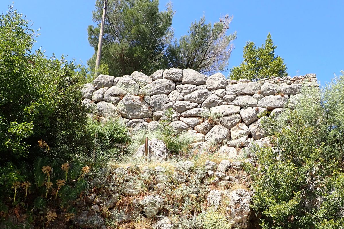  the ancient wall a the NE side, below the church of Agioi Taxiarches