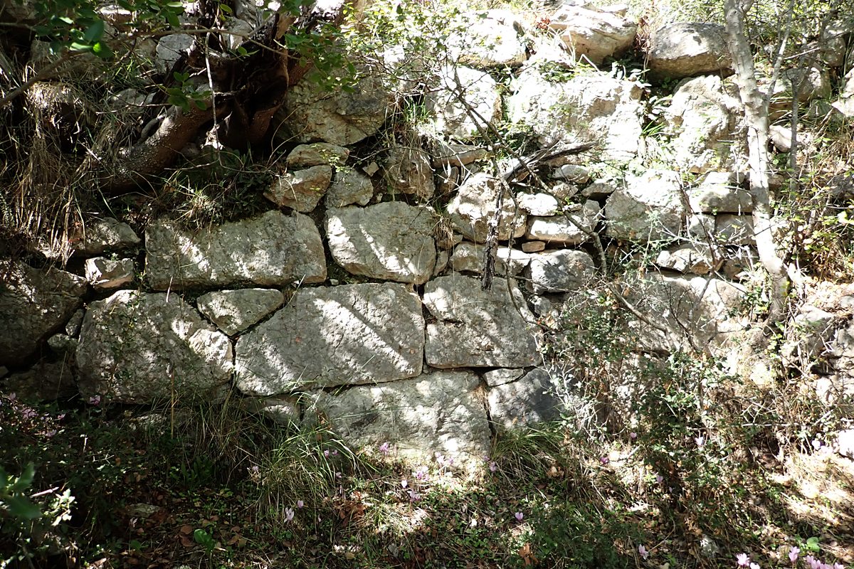 wall ruins approaching the gate at the east